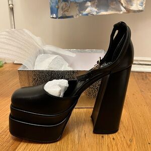 Black chunky leather platform heels with strap and charm Size 6